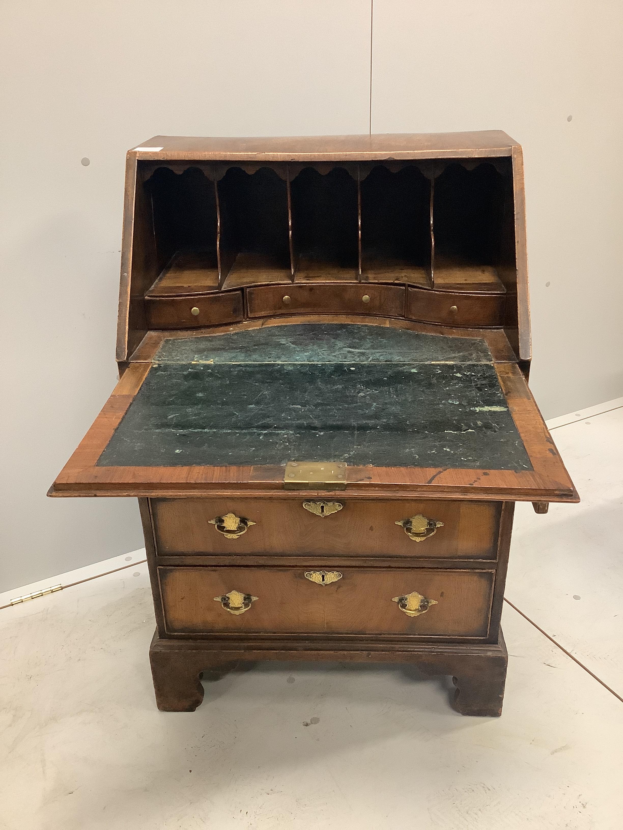 A small George I style feather banded walnut bureau, width 59cm, depth 39cm, height 94cm